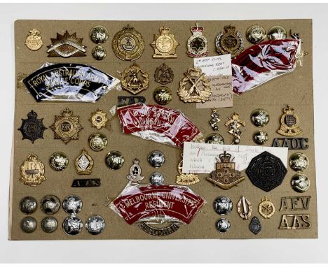 Australian Regiments. A display card containing cap badges, collar dogs, shoulder titles and buttons. An interesting lot. Not