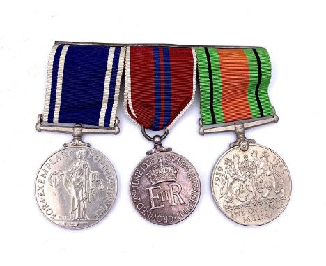 Police Medal Trio. Comprising: Long Service Medal (King George VI), Coronation 1953 Medal (Queen Elizabeth) and Defence Medal