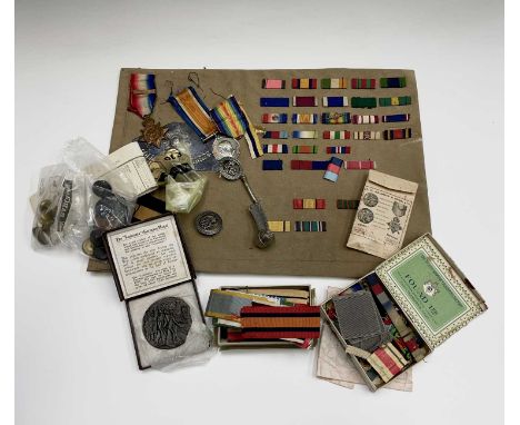 World War One Medals and Miscellaneous Military Items. Lot includes a 1914 Mons Star and Bar to Pte W E Watts ASC, a War Meda