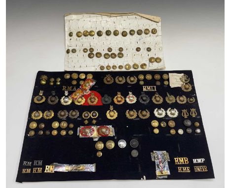 Royal Marines - 1. A cloth display of cap badges, collar dogs, shoulder titles and buttons. A large quantity including office