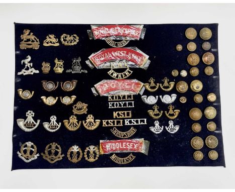 English Regiments - 49th-57th Foot. A display card containing cap badges, collar dogs, shoulder titles and buttons. Noted: Ro