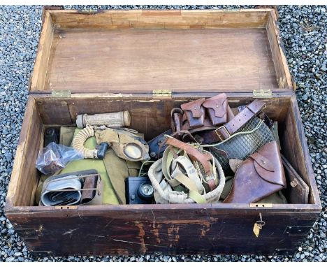 Military Trunk and contents. A Military Trunk (35" x 18" x 12") formerly the property of R. Whittock R.M. containing a quanti