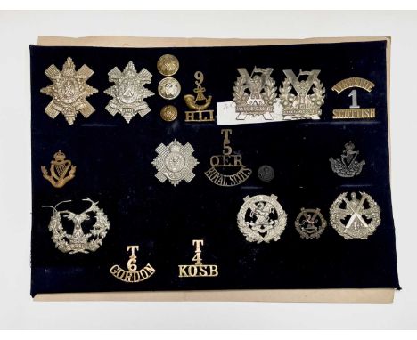 Scottish Territorial Army, etc. A display card containing cap badges, collar dogs, shoulder titles and buttons. Noted: Tynesi