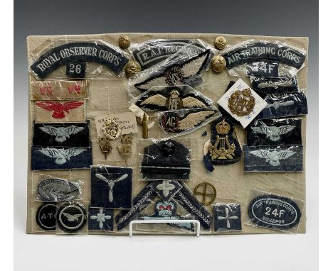 Royal Air Force / Royal Observer Corps / A.T.C etc - 1. A display card containing various cloth shoulder titles, plus cap bad