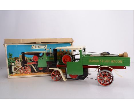 A boxed Mamod live steam SW1 Steam Wagon, a spirit-fired example in green and red with water-level plug, complete with spirit