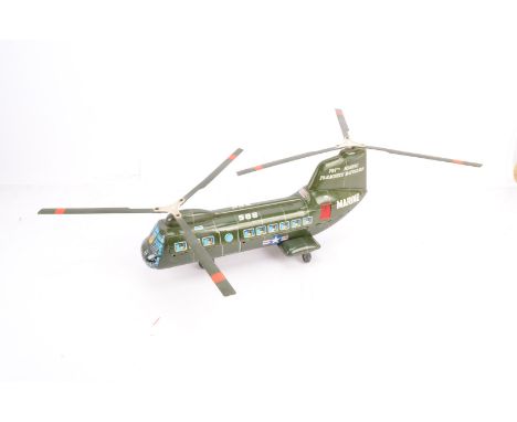 Marx Tin Plate US Army Helicopter, un boxed twin rotor helicopter 107th Marine Parachute Regiment, some minor wear clean batt