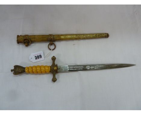 WWII German Kriegsmarine dagger with amber coloured handle stamped WKC in scabbard 