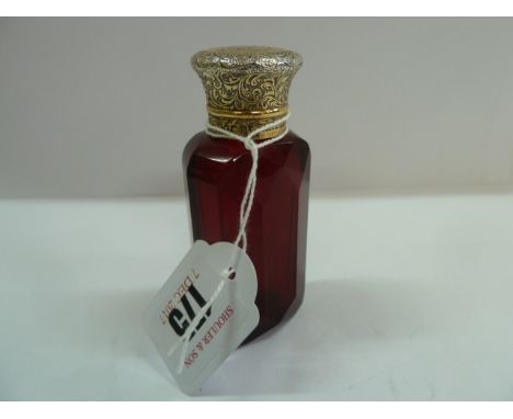 Ruby faceted glass scent bottle with gilt silver crew cap, Sampson Mordan - London 1873