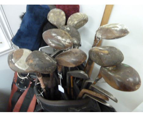 Quantity of vintage golf clubs 