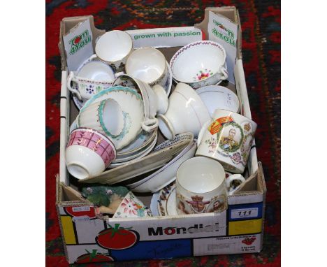 A box of pottery and china, mainly cups and saucers including commemorative examples.