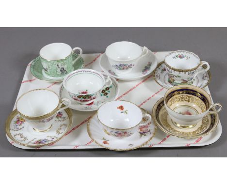 A tray of seven decorative cabinet cups and saucers to include, Wedgwood millenium, Spode and Paragon etc.