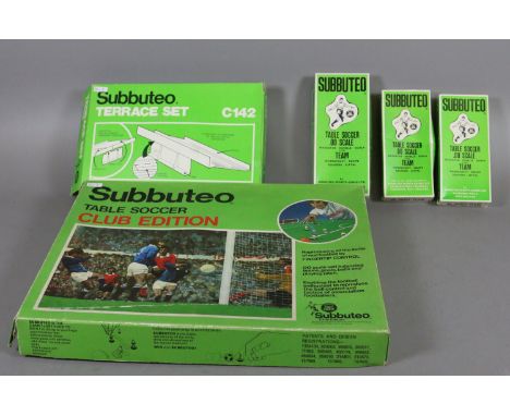 A boxed Subbuteo club edition table soccer set along with a terrace set and boxed teams.