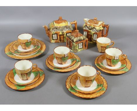 A cottage ware part tea service approximately twenty pieces.