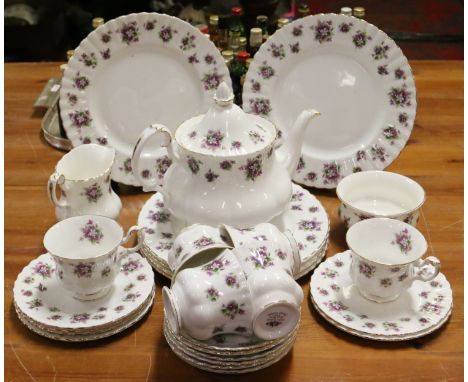 A Royal Albert six place tea service decorated in the sweet violets pattern.