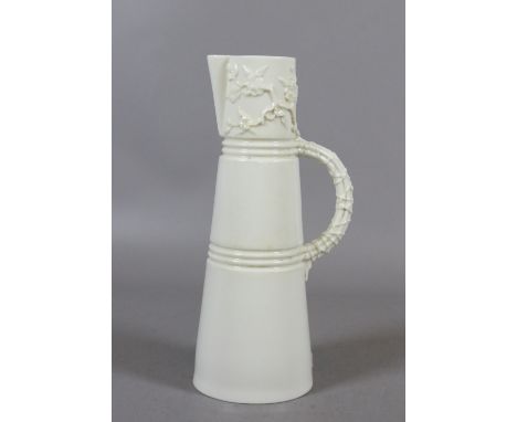 A Royal Worcester tapering ewer with prunus blossom moulding.