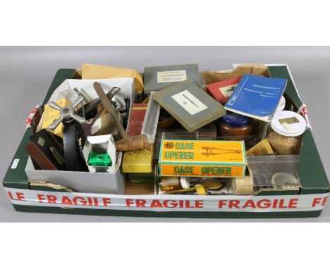 A collection of watch and clock repairers tools, case openers, files, etc.