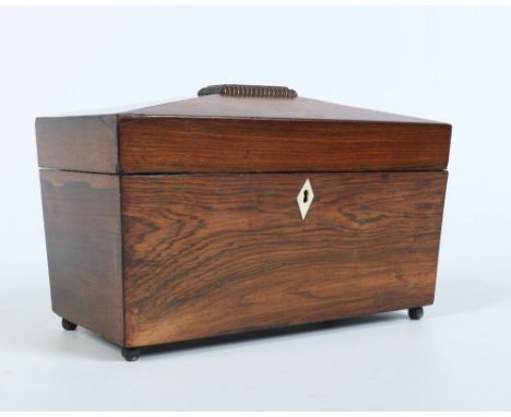 A Victorian rosewood tea caddy of sarcophagus form and with fitted interior, 30cm wide. Condition Report. To be used as a gui