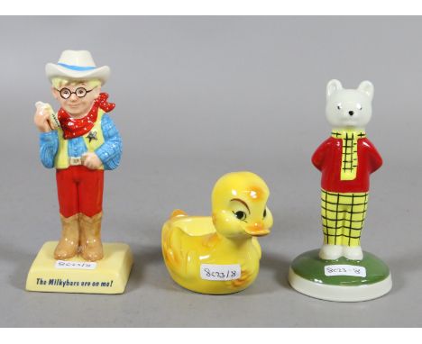 A Goebel model of a duck along with a Wade model of Rupert together with a Royal Doulton figure 'The Milky Bar Kid'.