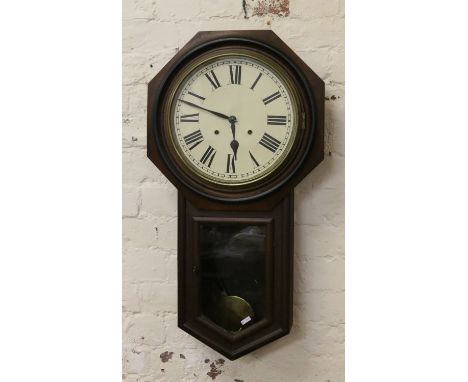 An early 20th century American Ansonia eight day drop dial wall clock chiming half-hourly on a gong. In mahogany case with eb