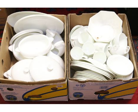 Two boxes of white ceramic dinnerwares approximately sixty five pieces to include tureens, bowls, meat plates and condiments.