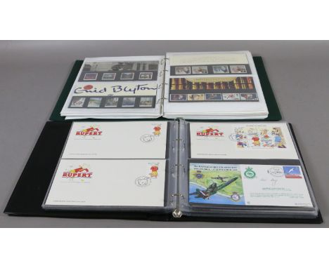 Two albums of first day covers by Royal Mail.
