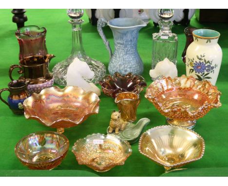 A collection of ceramics and glass to include Art glass, decanters, copper lustre jugs, Wade pipe stand, Carnival glass, soap
