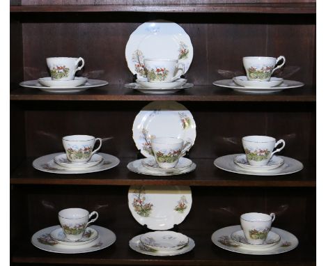 A Regency bone china dinner/tea service decorated with hunting scene (approximately twenty nine pieces).