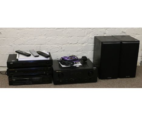 A Marantz PM700 stereo amplifier and Mission loud speakers, two Marantz compact disc players, a Denon tuner, connecting leads