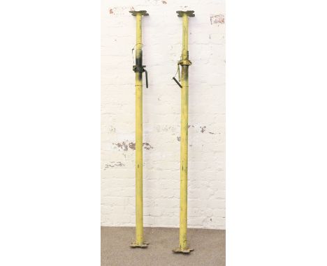 A pair of painted Acro building props in good working condition.