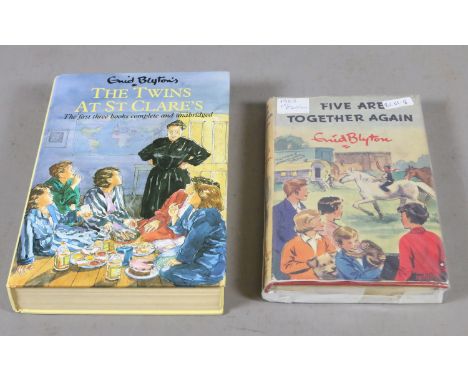 A copy of Enid Blyton The Twins at St Clare's, along with a 1963 first edition Five are Together Again.