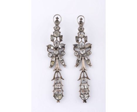 A pair of earrings, silver, set with “Minas-Novas” (quartz and aquamarine), composed of a top element, central bow and pendan