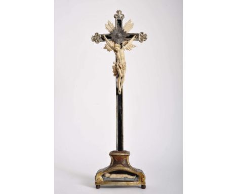 A crucifix, crucified Christ and reclining Christ - two ivory sculptures, painted, silvered and gilt wood base and cross, sil