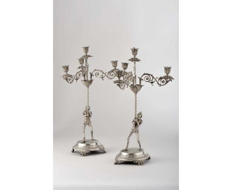 A pair of four-light chandeliers, romantic, 833/1000 silver, jester-shaped stem, spiral decorations and guilloche pattern, Po