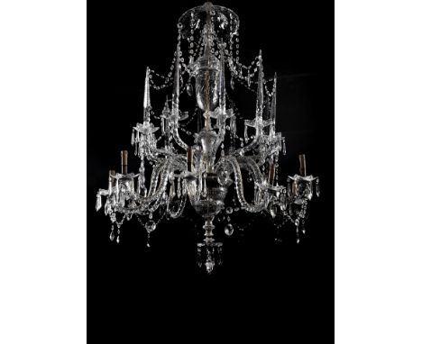 A ten-light chandelier, gilt iron structure, glass arms, pendants, spiers and glass, European, 19th C., upper plate, two piec