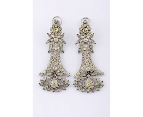 A pair of earrings, silver and gold, set with chrysolites (chrysoberyls), Portuguese, 19th C., signs of use, altered clasps, 