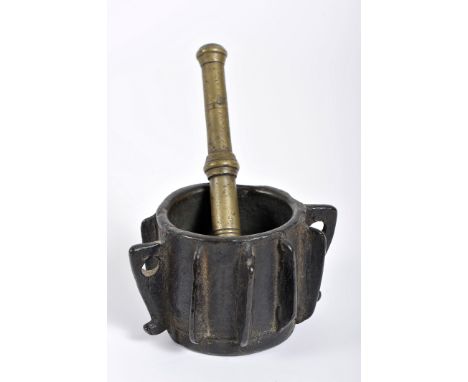 A mortar, gothic, bronze, decoration en relief "Ribs" with two holes for rings, Iberian, 15th/16th C., non-original pestle, D