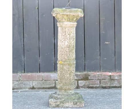 A reconstituted stone sundial, 80cm high