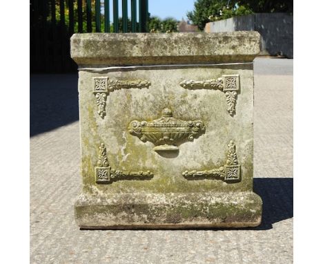 A reconstituted stone planter, with relief decoration, 48cm