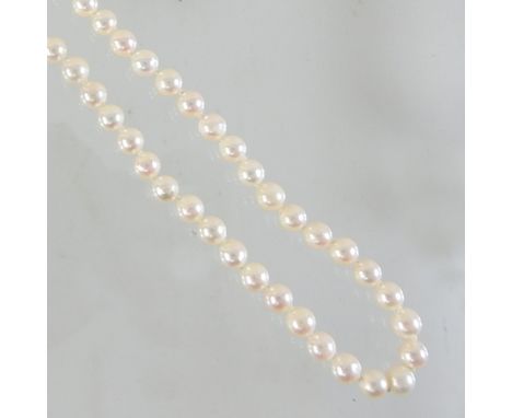 A pearl necklace, with a 9 carat gold clasp