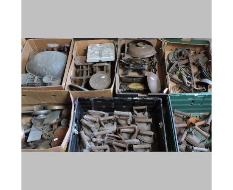 A large collection of metalwares, to include scales, flat irons and other items