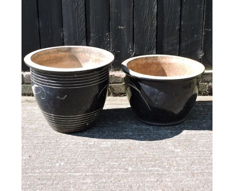 A blue glazed planter, 40cm high, together with another smaller