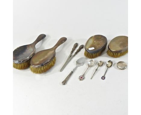 A pair of early 20th century silver brushes, J & R Griffin, Chester 1912, together with another pair, Chester, 1915, curling 