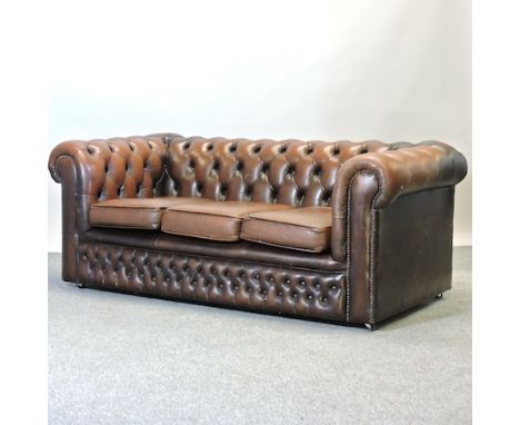 A brown leather upholstered chesterfield sofa, 195cm