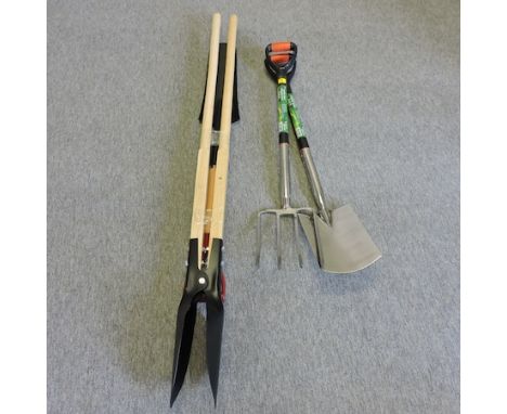 A garden fork and spade set, together with a posthole digger and spade set