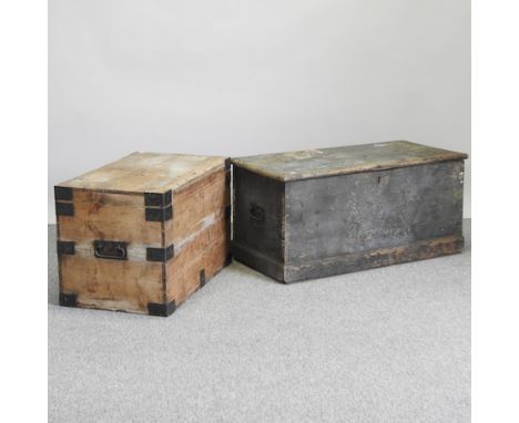 An antique black painted pine trunk, 98cm, together with another smaller