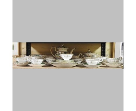 A 19th century Rockingham style part tea service