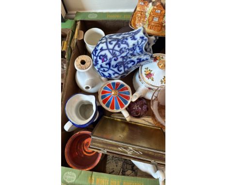 Mixed lot of vintage ceramics including a blue and white floral pitcher, a floral teapot, a red, white, and blue teapot, and 