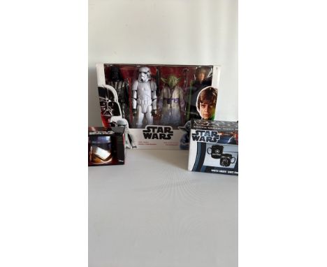 Star Wars action figure set includes Darth Vader, Stormtrooper, Yoda, and Luke Skywalker. Star Wars Darth Vader giant mug set