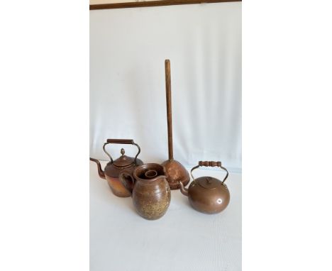 Copper kettle with brass finial, traditional design, polished finish.
