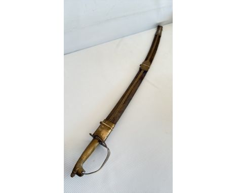 Mid to early 20th century sabre with brass hilt and scabbard, detailed blade etching.